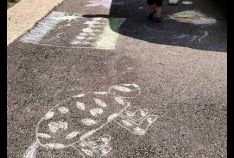 Our residents showed off their talent by designing a chalk masterpiece in front of their home. Every household that participated was entered to win a prize. The Popsicle Patrol kicked off the event by handing out polsicles to everyone who was outside chal